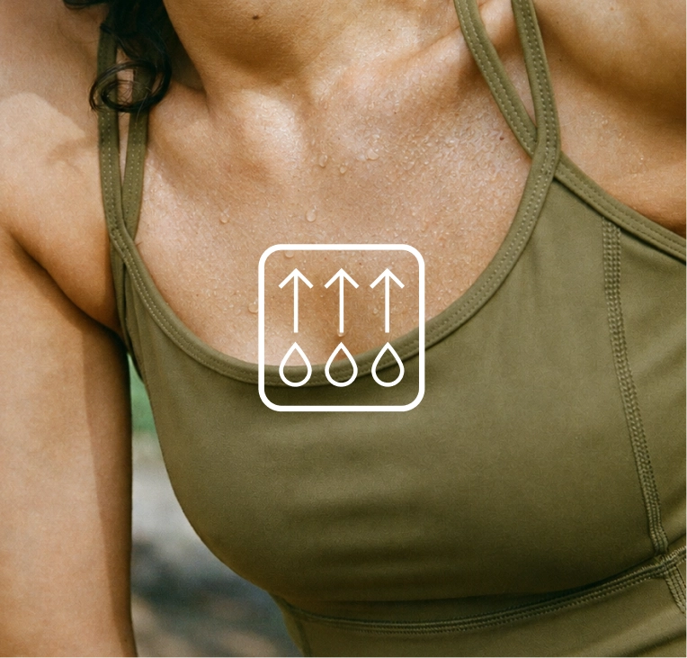 Close view of an olive sports top with a moisture icon