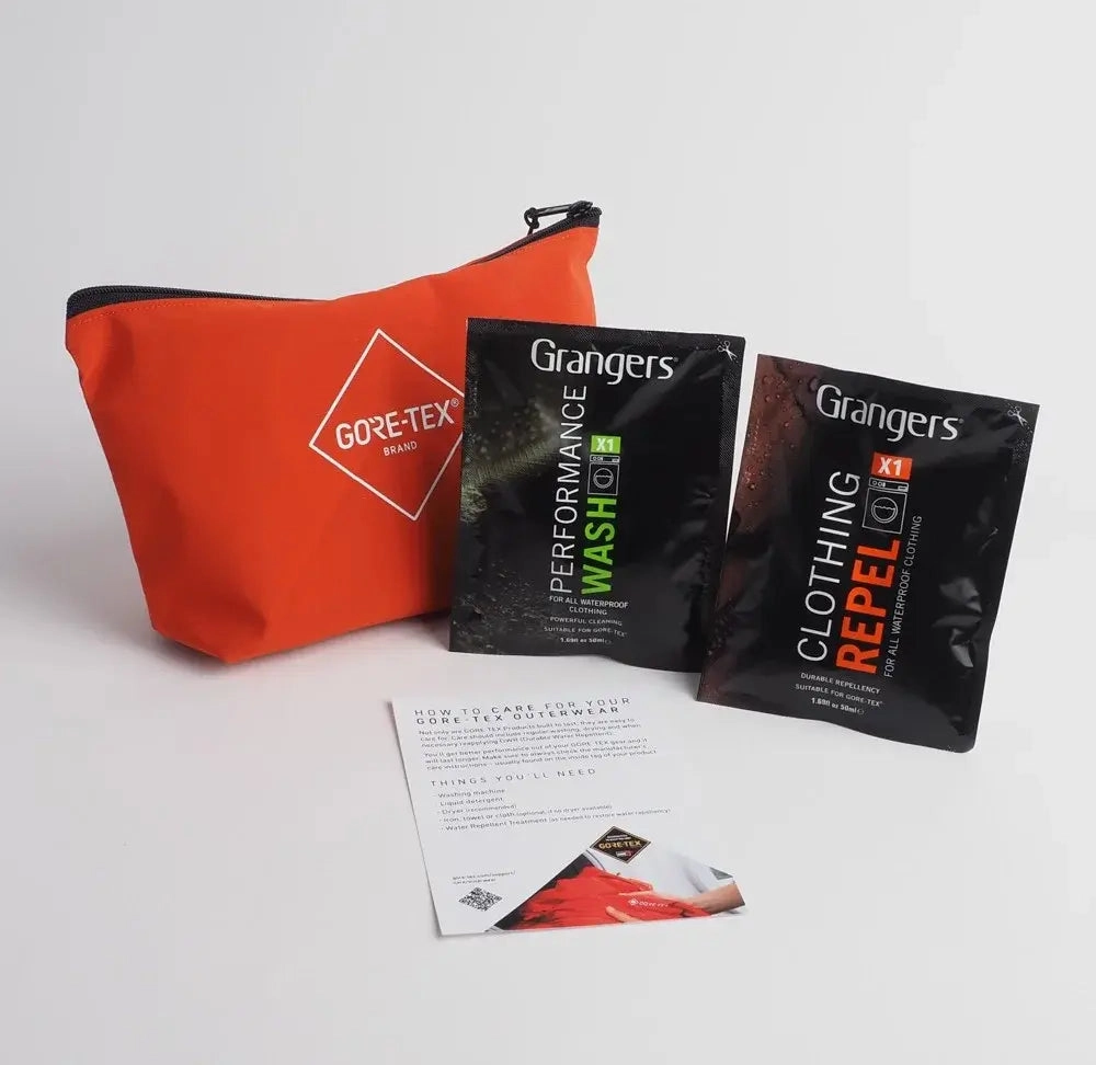 Orange pouch with GORE-TEX care kit packets