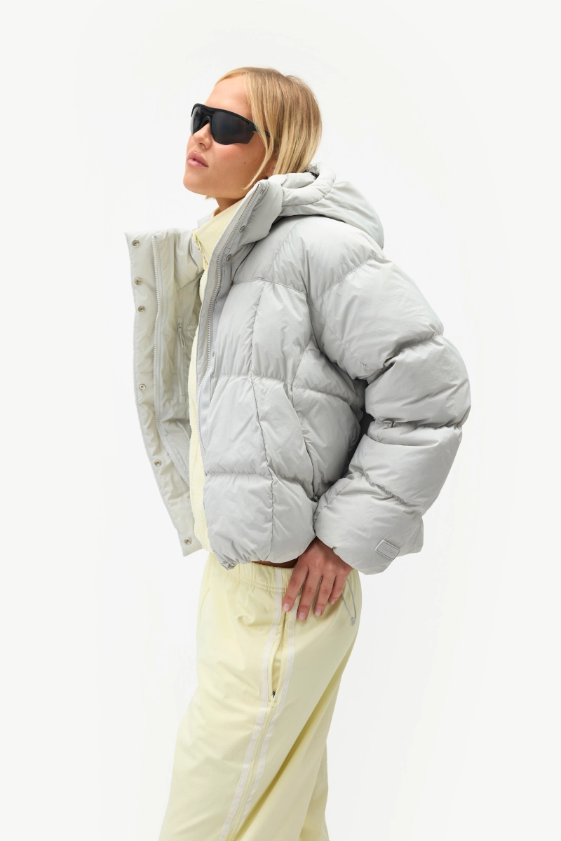 Light gray Louise Down Jacket worn with pale pants