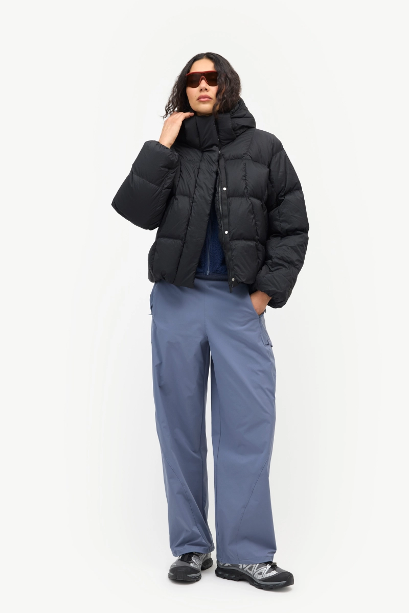 Black Louise Down Jacket worn with blue pants